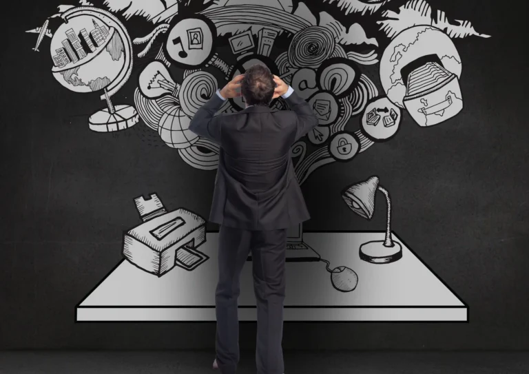 A Digital Marketing Specialist Saudi Arabia man in a suit stands facing a chalkboard filled with swirling drawings of various symbols, including a globe, lock, and light bulb, above a desk with a lamp and printer.